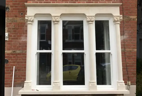 Bay window restoration in Bath stone by London Stonemasonry