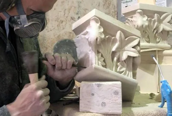 Carving a bay window at London Stonemasonry's workshop