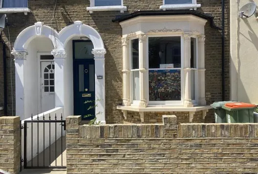 A new bay window for a Victorian era home